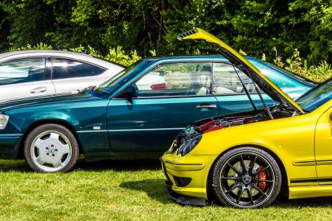 Yellow Mercedes with the bonnet open